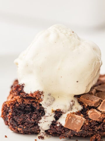a slice of easy chocolate dump cake with ice cream on top