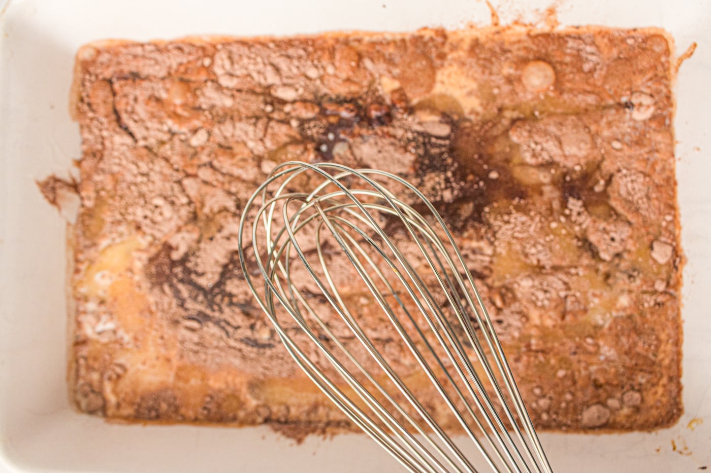 whisking chocolate dump cake ingredients
