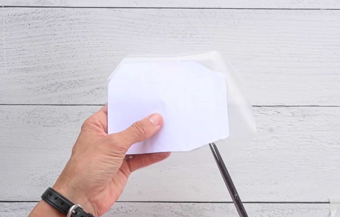 cutting tabs in excess contact paper around a milk carton printable to make a diy paper squishy