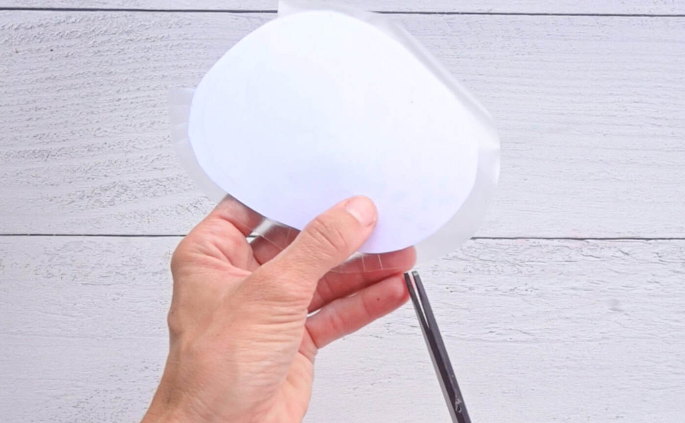 cutting tabs in contact paper for a diy paper avocado squishy