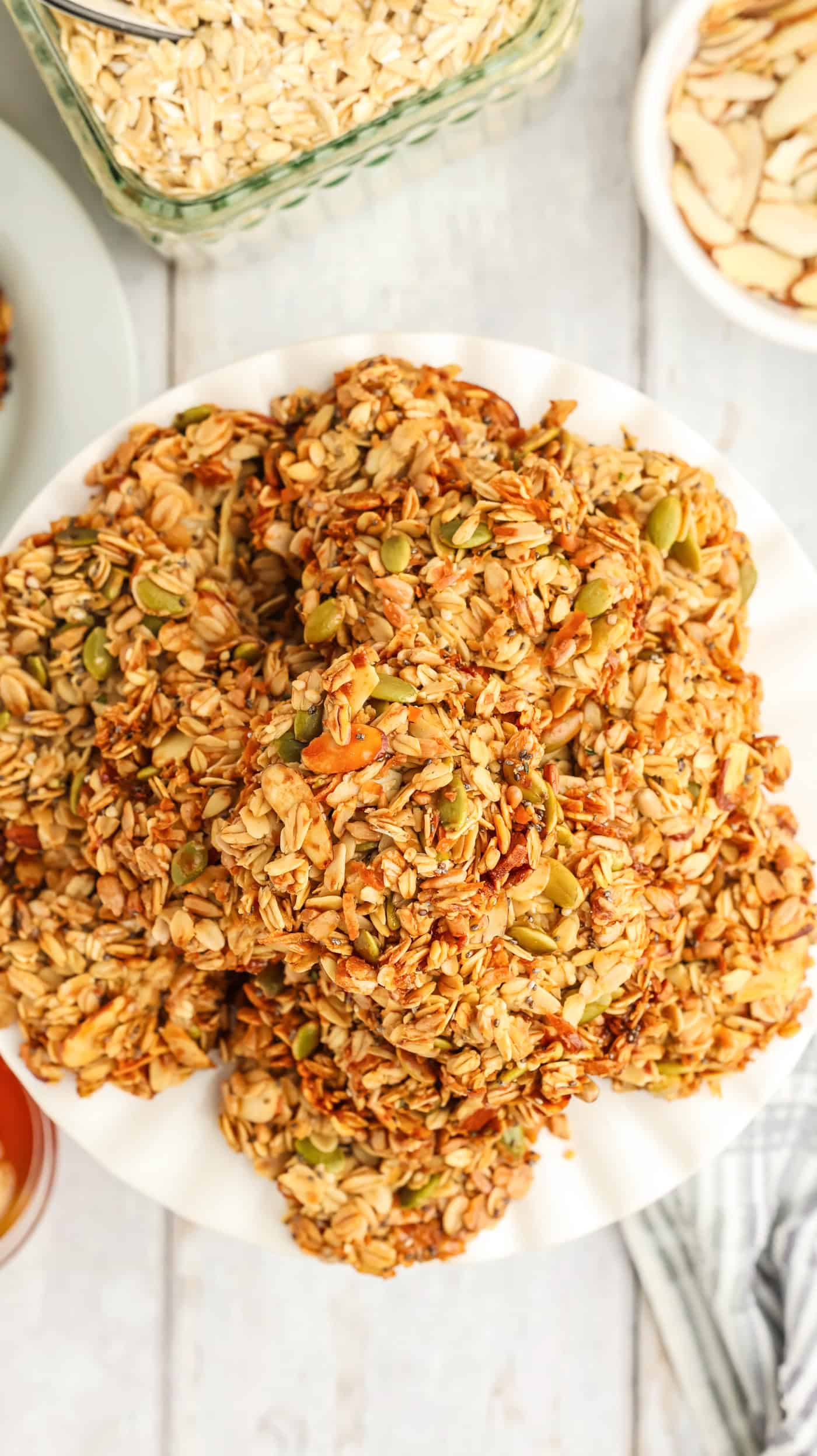 a top down photo of a plate of baked granola cookies