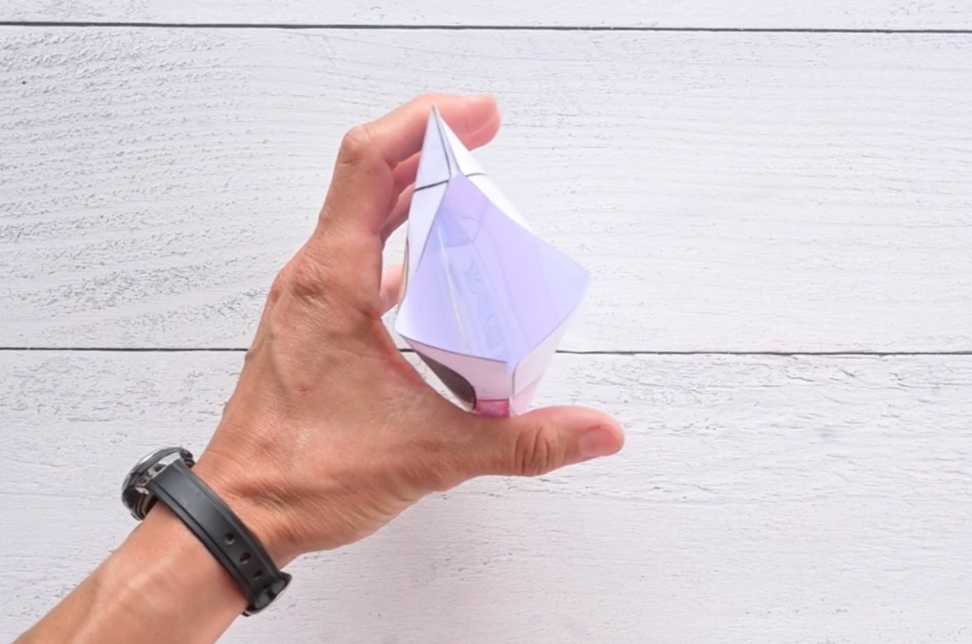 opening in the bottom of a paper squishy to insert stuffing
