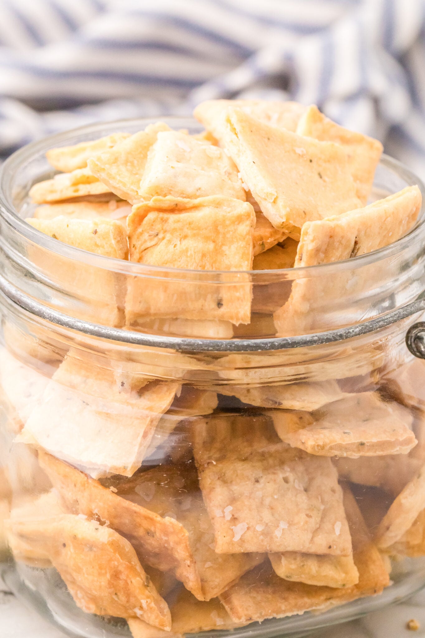 sourdough discard crackers in a glass jar