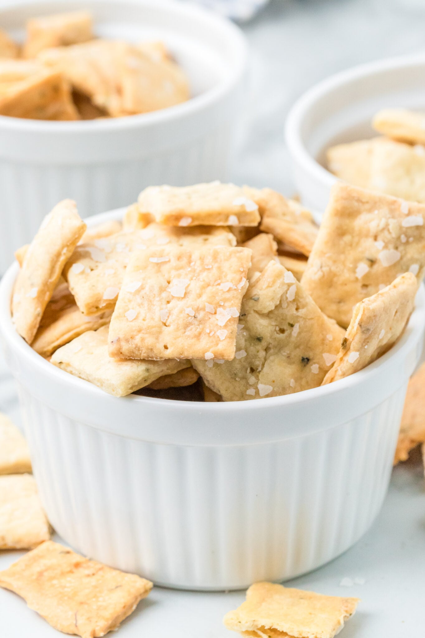 sourdough discard crackers in a white ramekin
