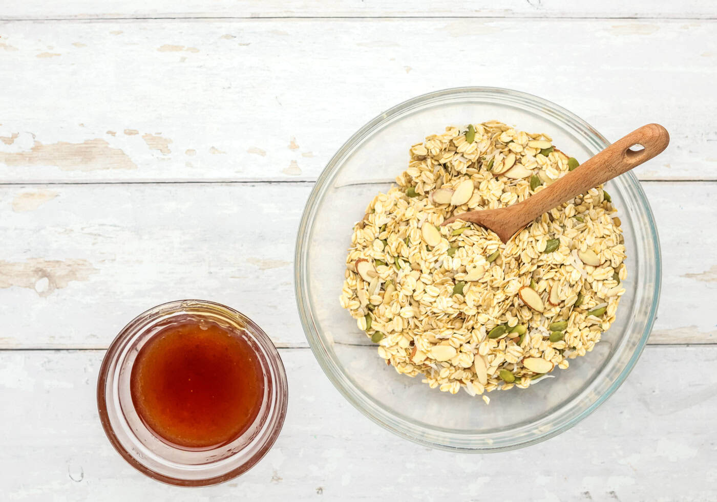 adding wet ingredients to dry ingredients for gluten free granola cookies