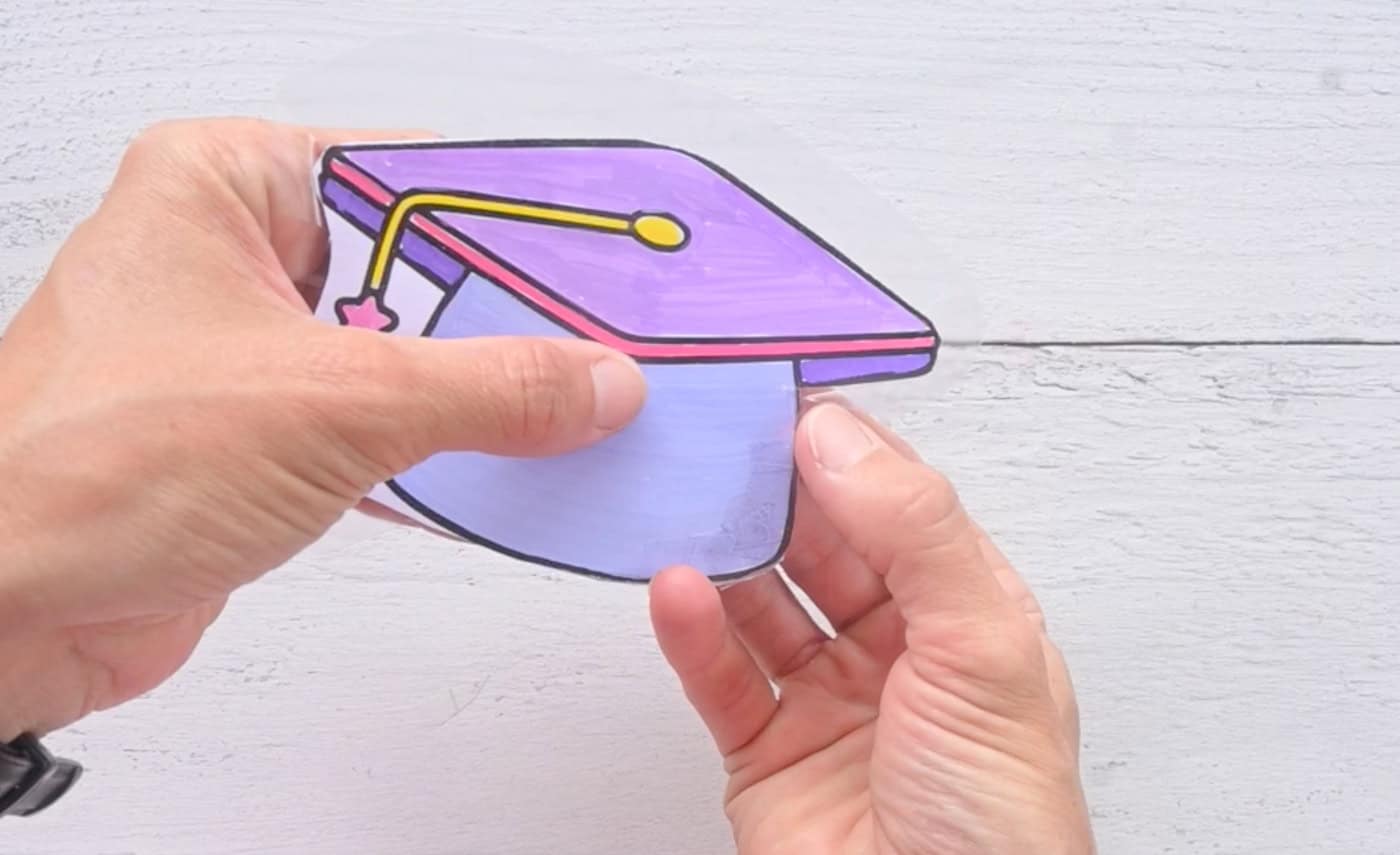 taping the back portion of a diy paper squishy into place