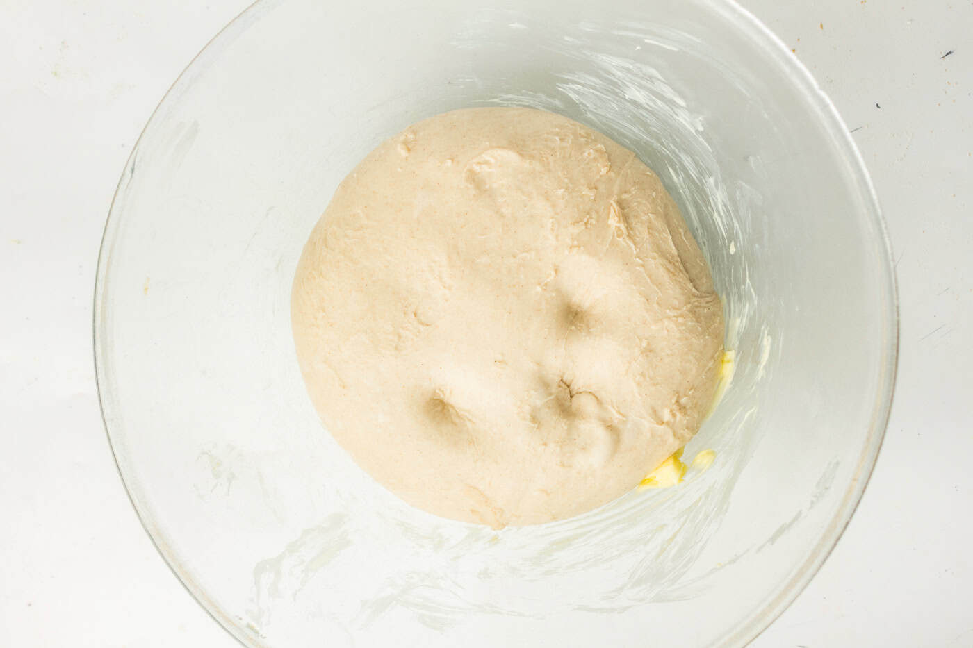 sourdough dough in a. bowl ater rising