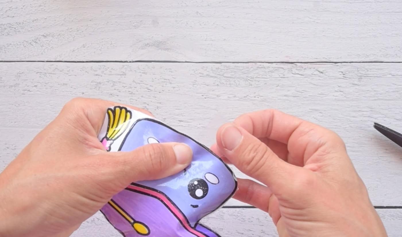 taping a DIY paper stuffy shut
