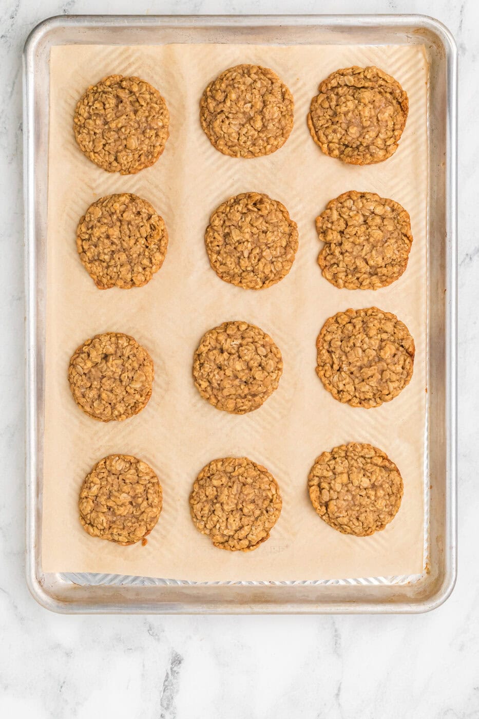 a baked sheet of cookies for homemade oatmeal cream pies