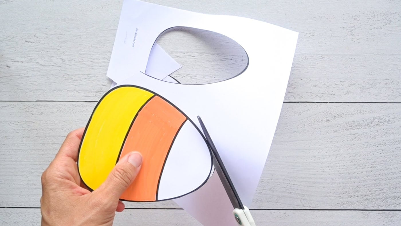 cutting out a candy corn template