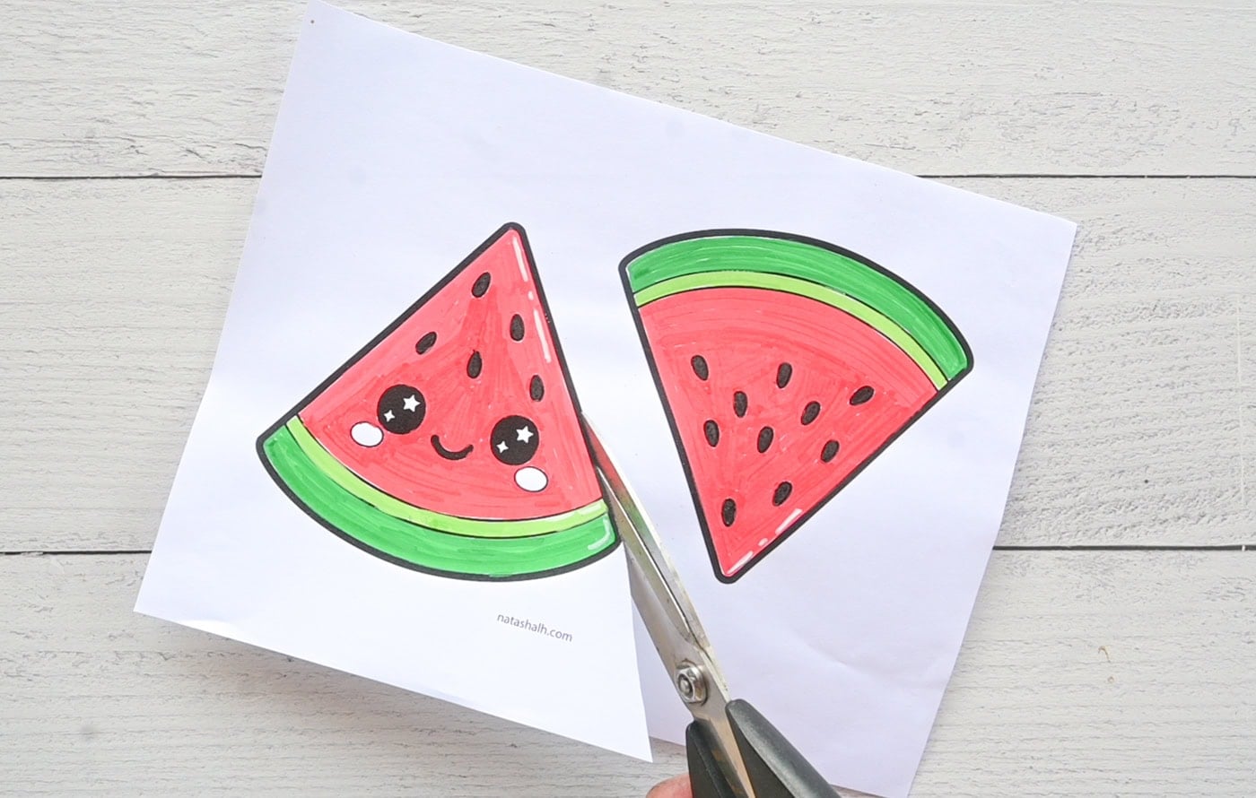 cutting out paper templates for a paper squishy watermelon