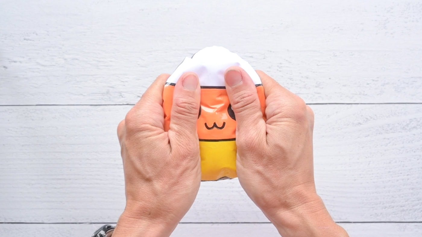 squishing a diy candy corn paper squishy