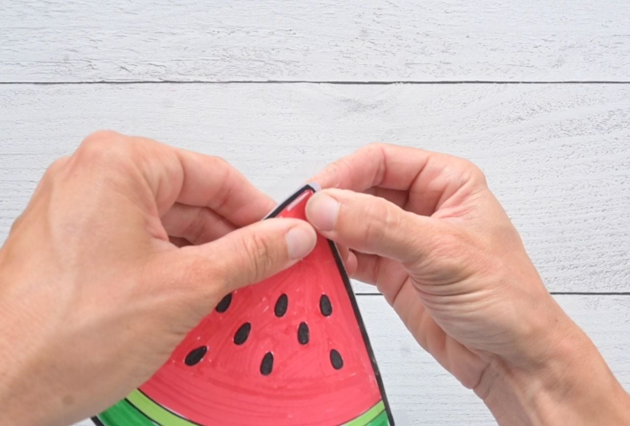 taping up a paper squishy watermelon