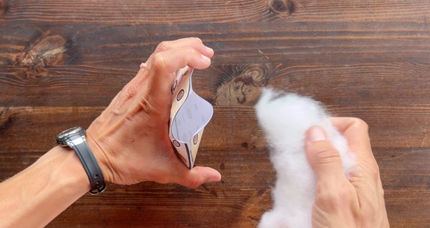 stuffing a paper squishy cookie with polypill