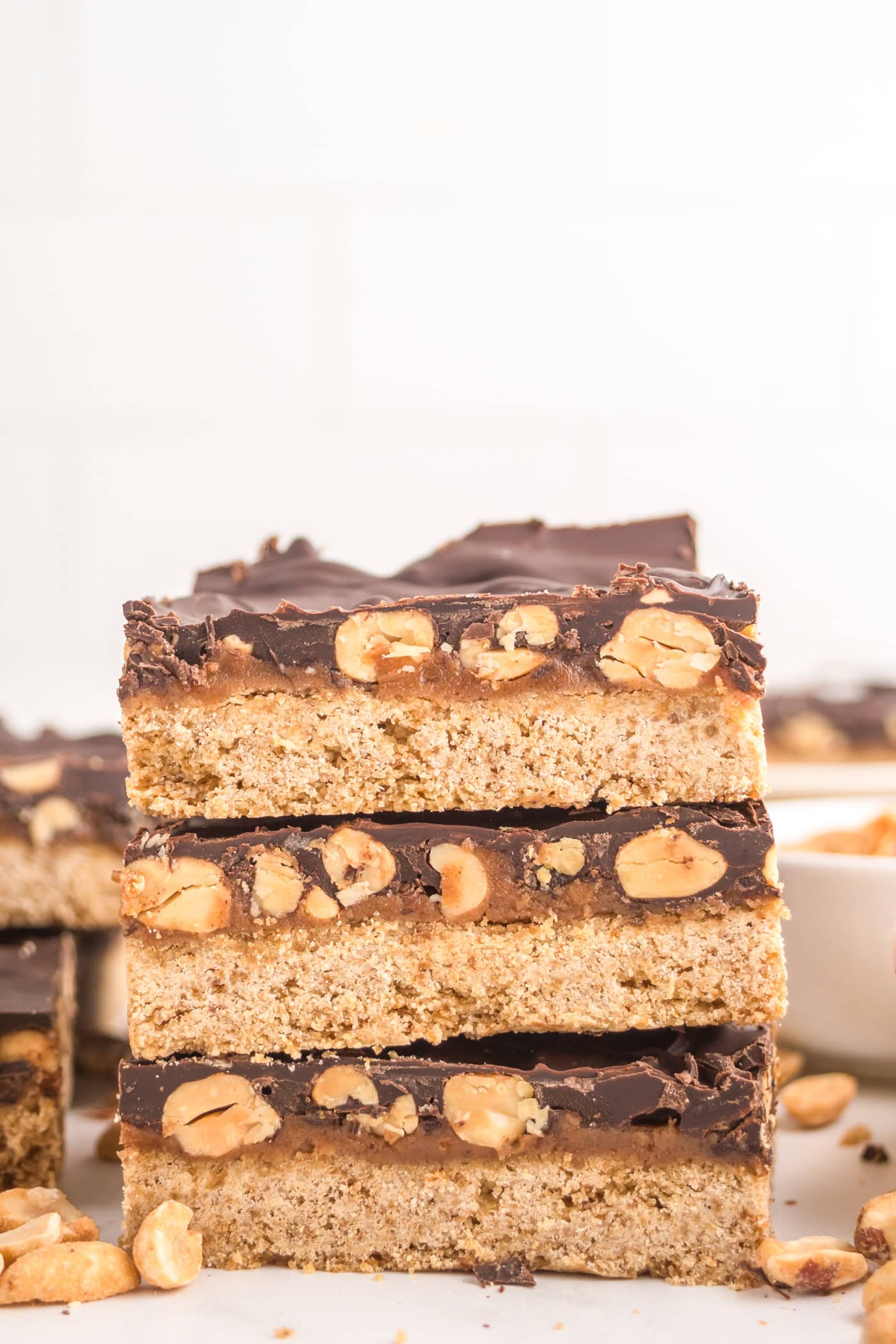 a stack of dairy free healthy snickers bars