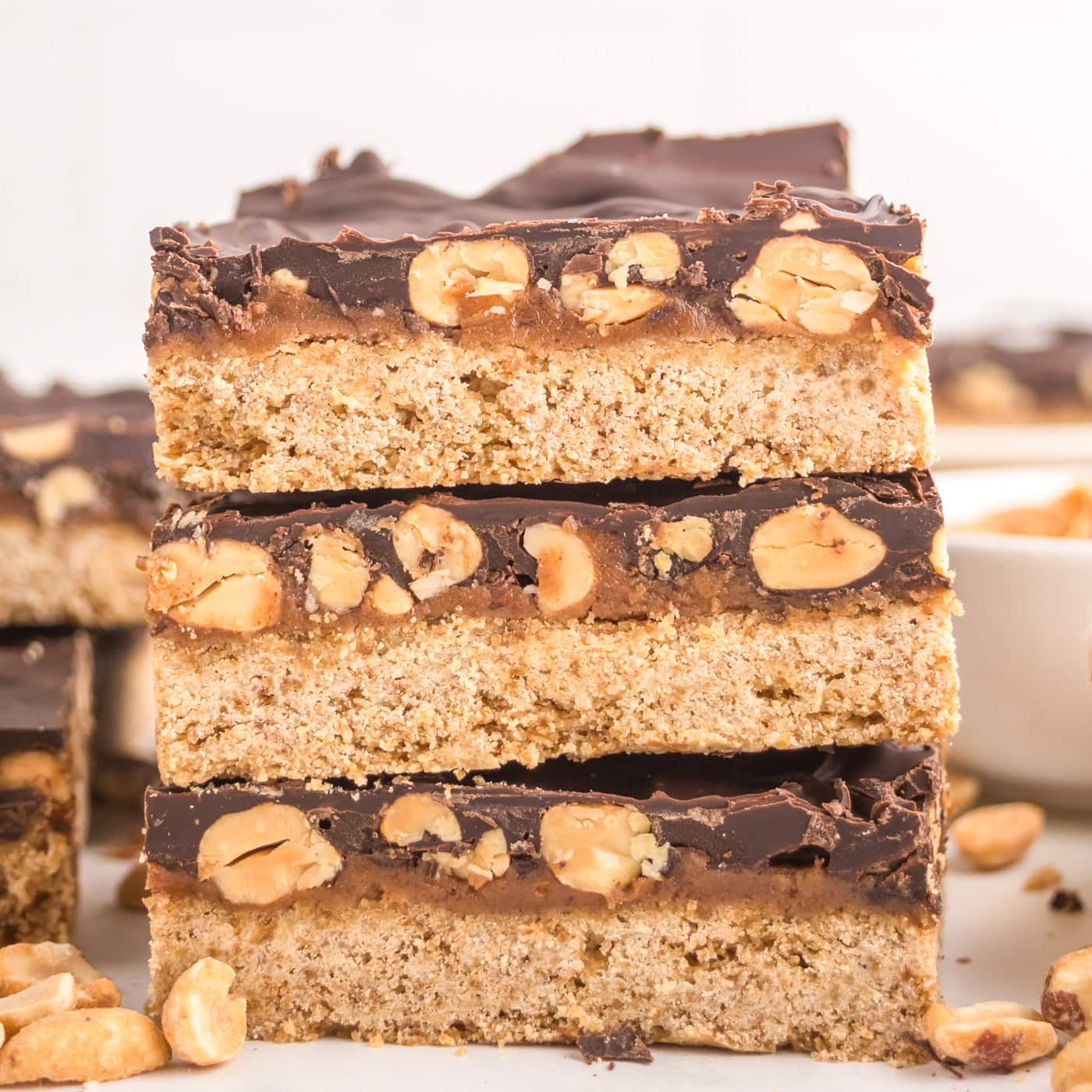 a stack of three dairy free copycat Snickers bars