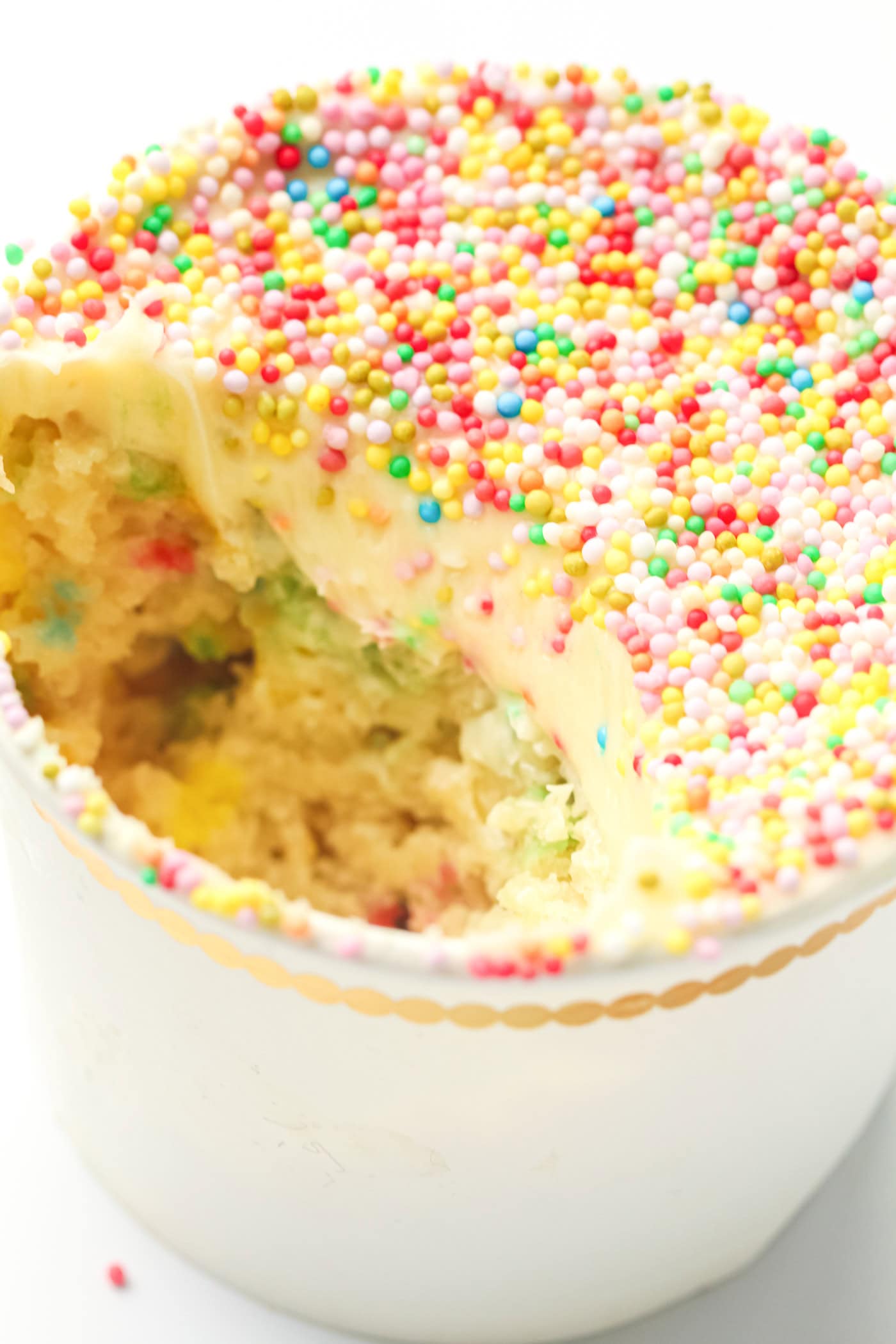 a gluten ree dot cake with a large scoop removed
