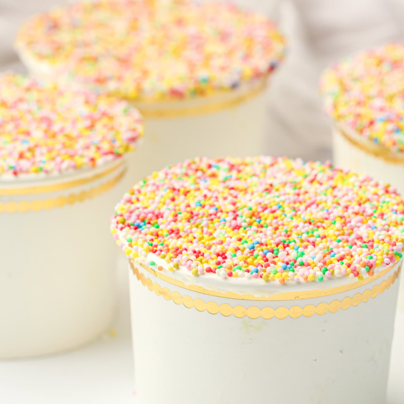 gluten free dot cakes in white paper cups