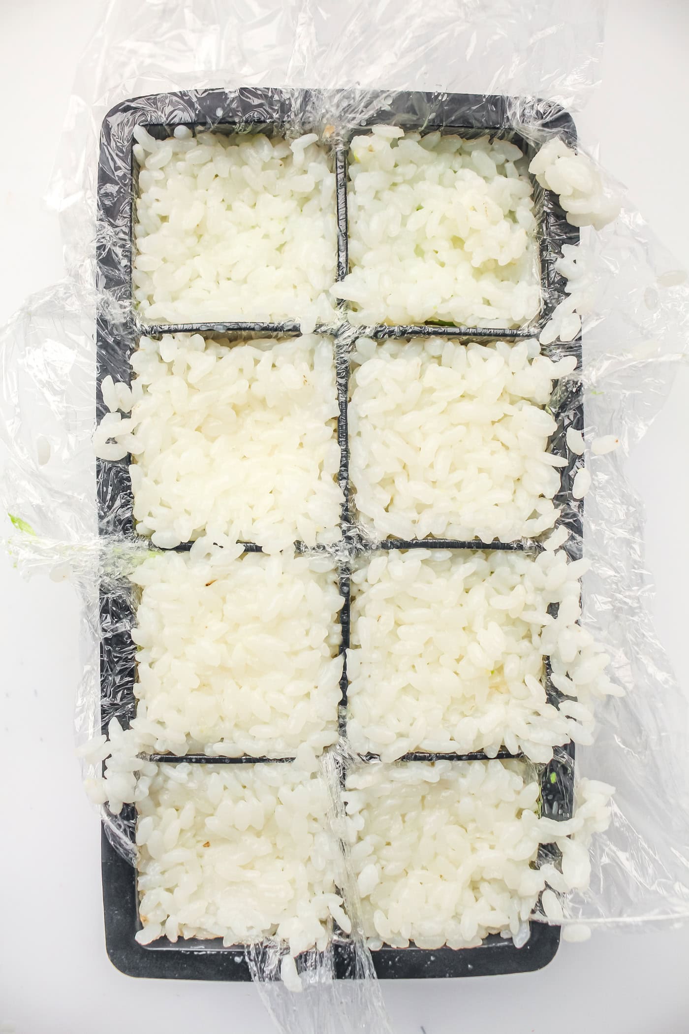 rice backed into an ice cube tray for ice cube tray sushi salmon rolls