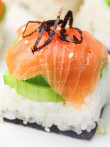 an ice cube tray sushi salmon roll