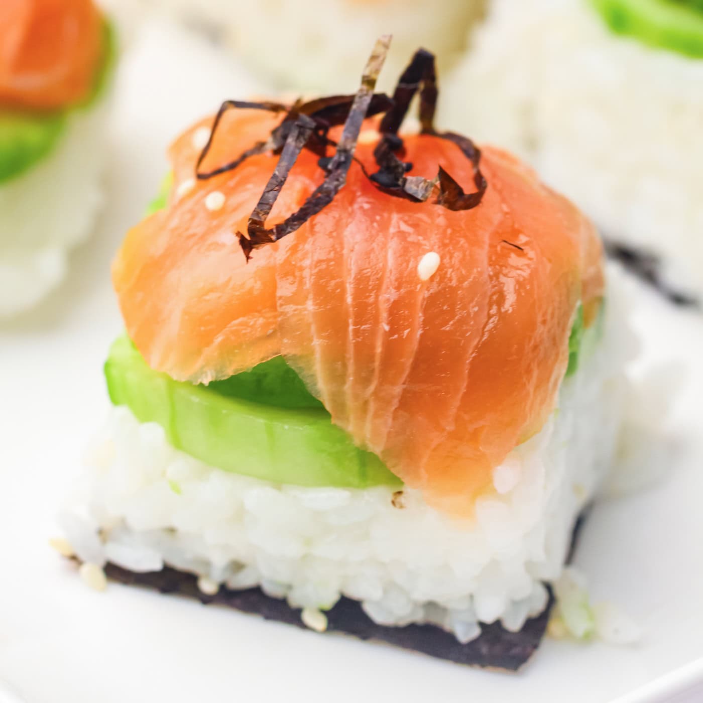 an ice cube tray sushi salmon roll