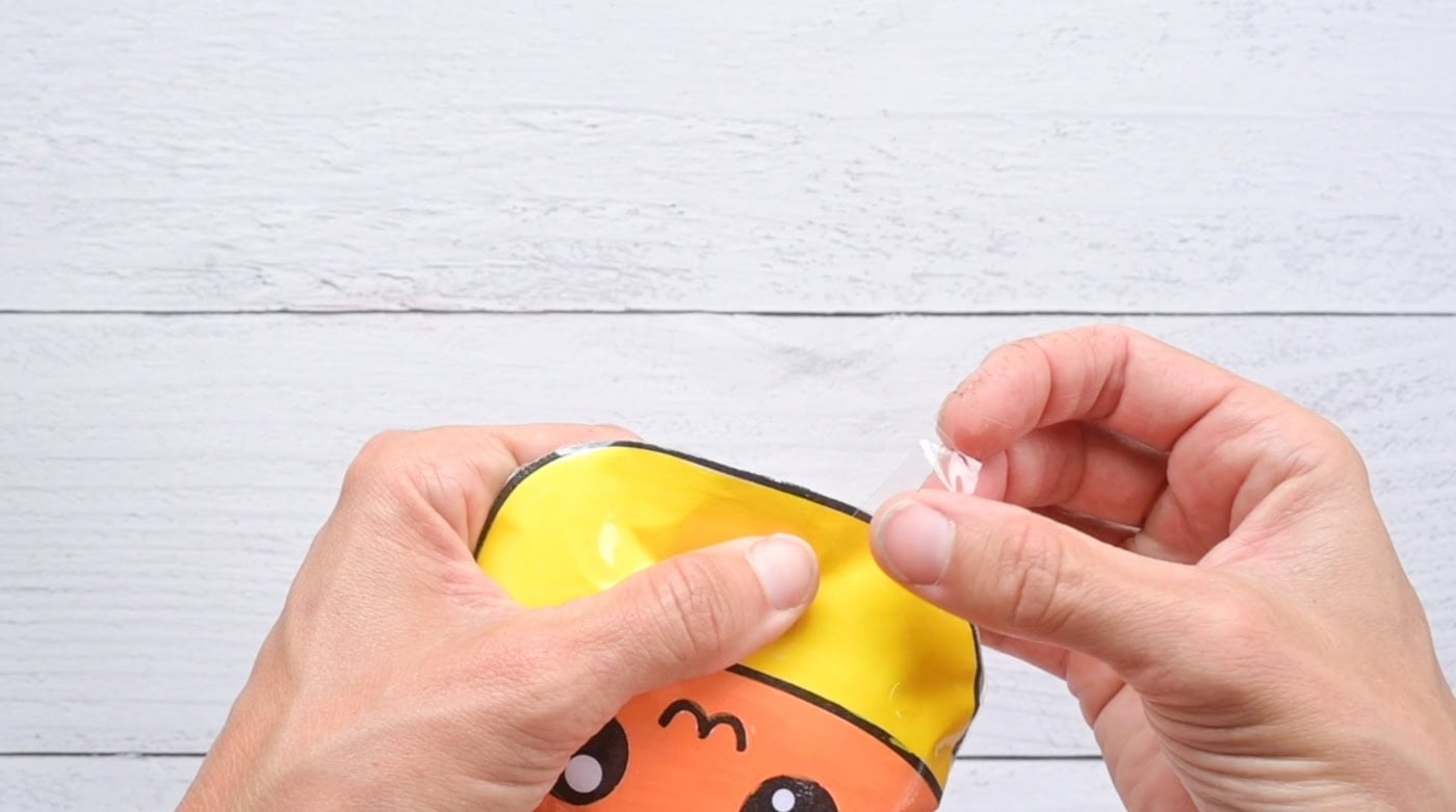 taping up a diy paper candy corn squishy