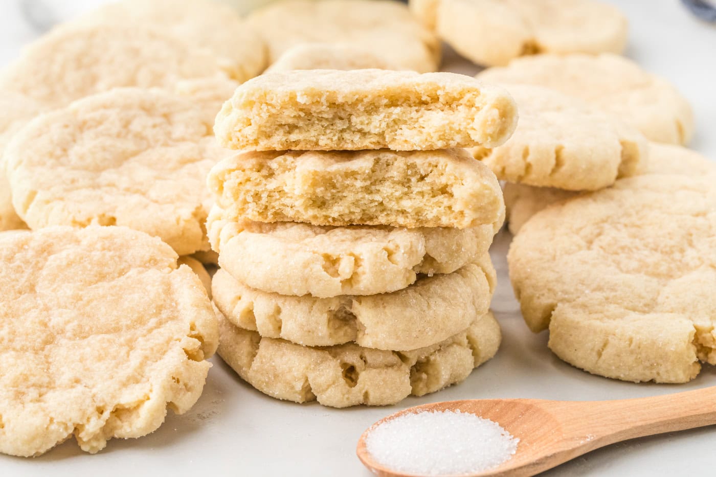 sourdough discard sugar cookies with bites taken out of the top two