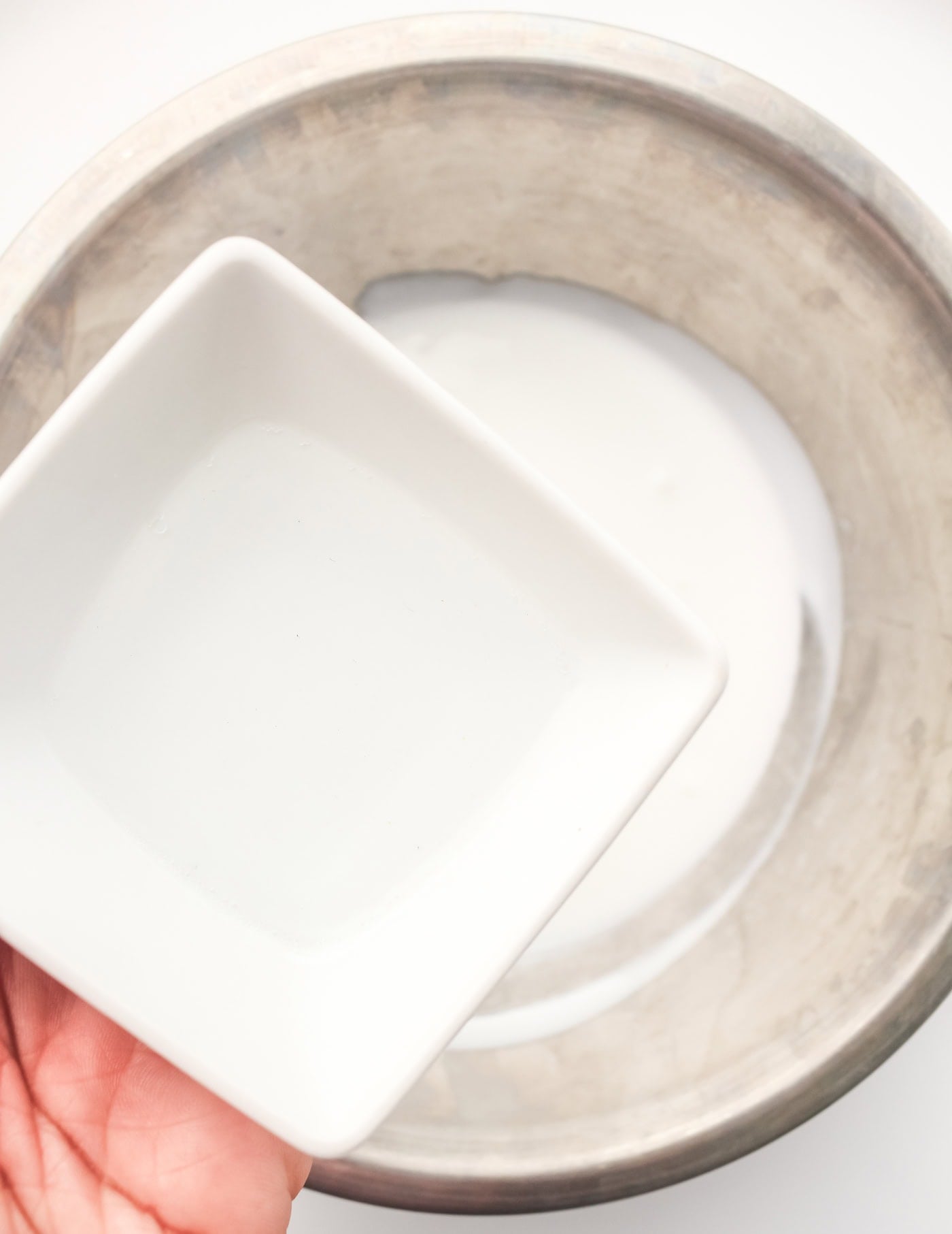 adding contact lens solution to DIY slime