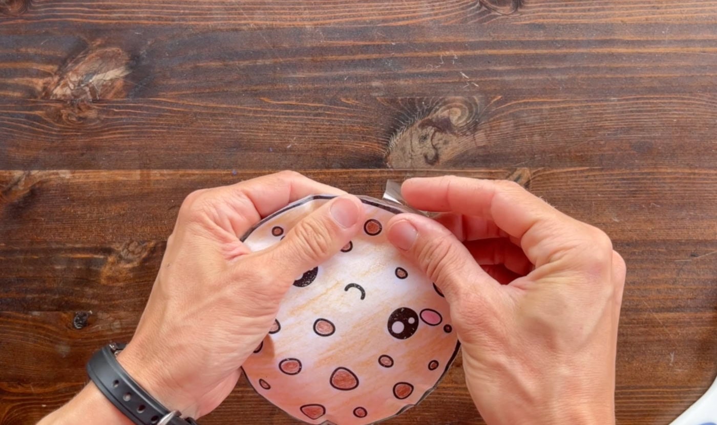 taping a paper squishy craft closed