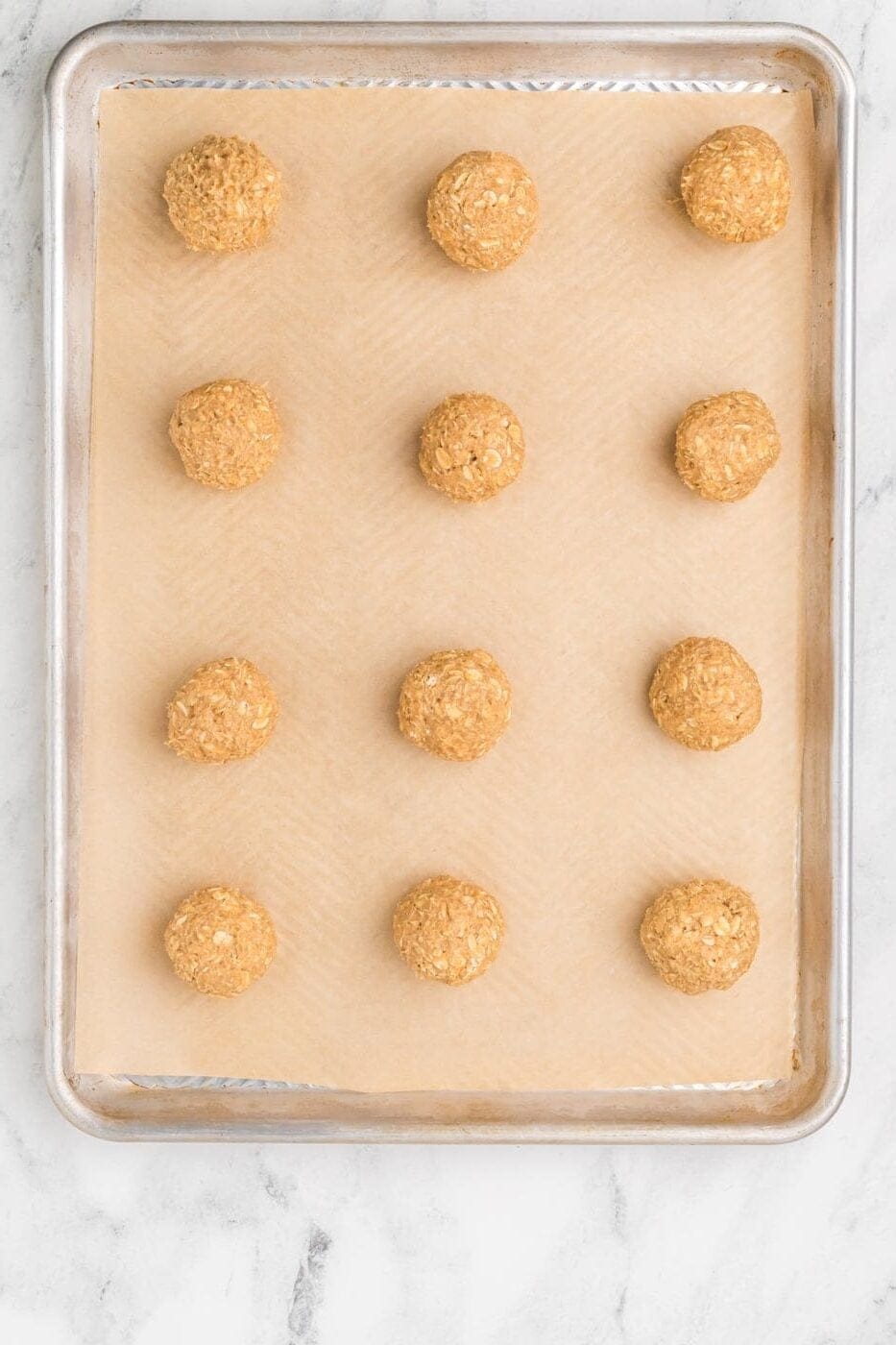 dough on a cookie sheet for homemade oatmeal cream pies
