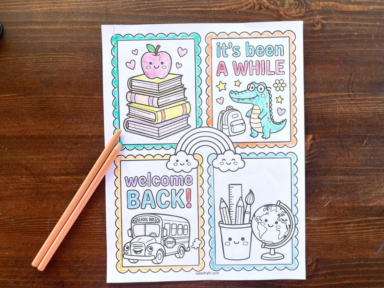 a partially colored back to school coloring page next to two colored pencils
