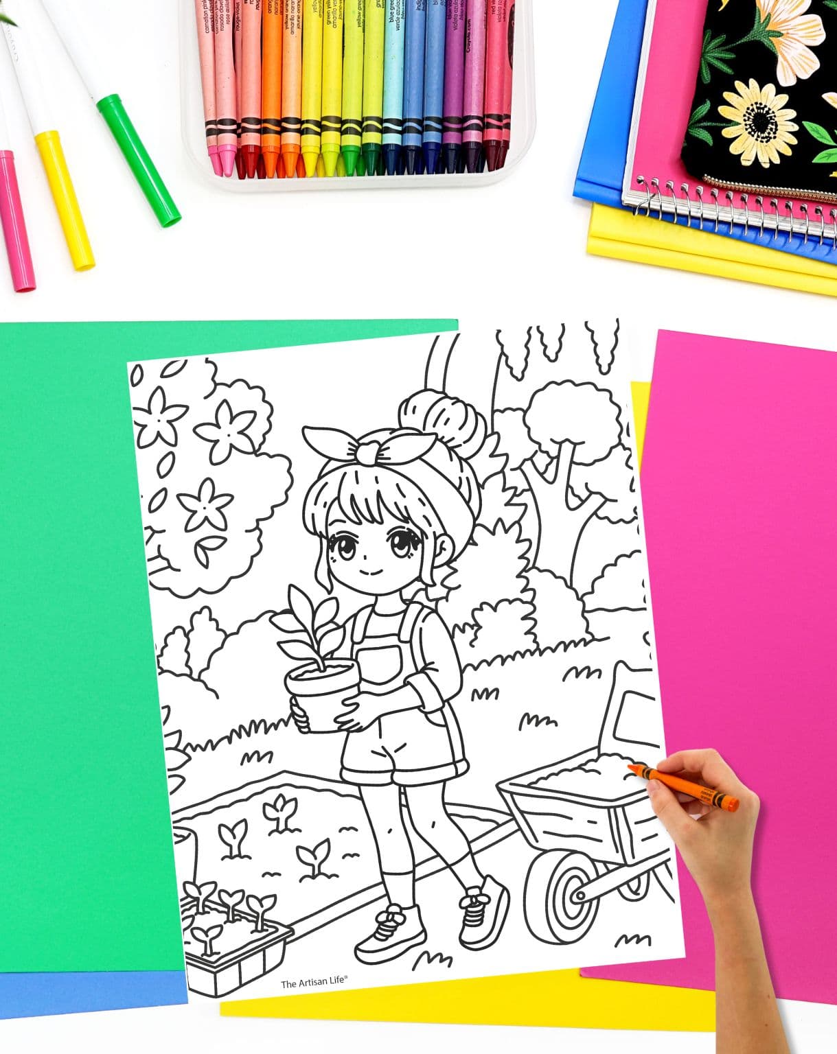 a hadn't with a crayon preparing to color a coloring sheet showing a chibi girl gardening