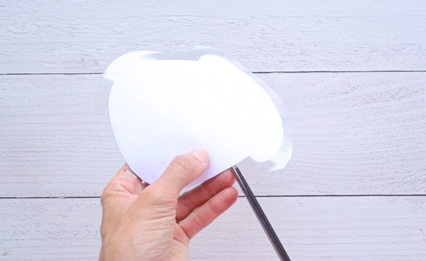 cutting tabs in contact paper laminating the front of a. mushroom paper squishy