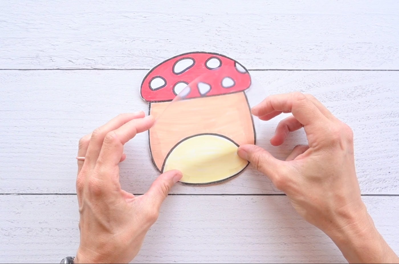 laminating the back of a mushroom paper squishy