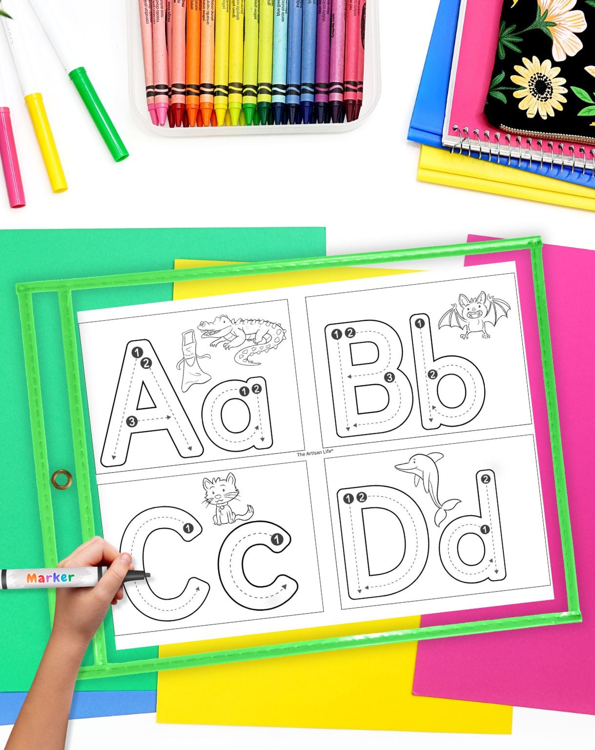 a page of alphabet tracing cards a - d in a dry erase pocket