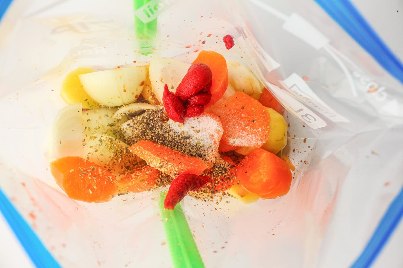 vegetables and seasonings in a gallon freezer bag