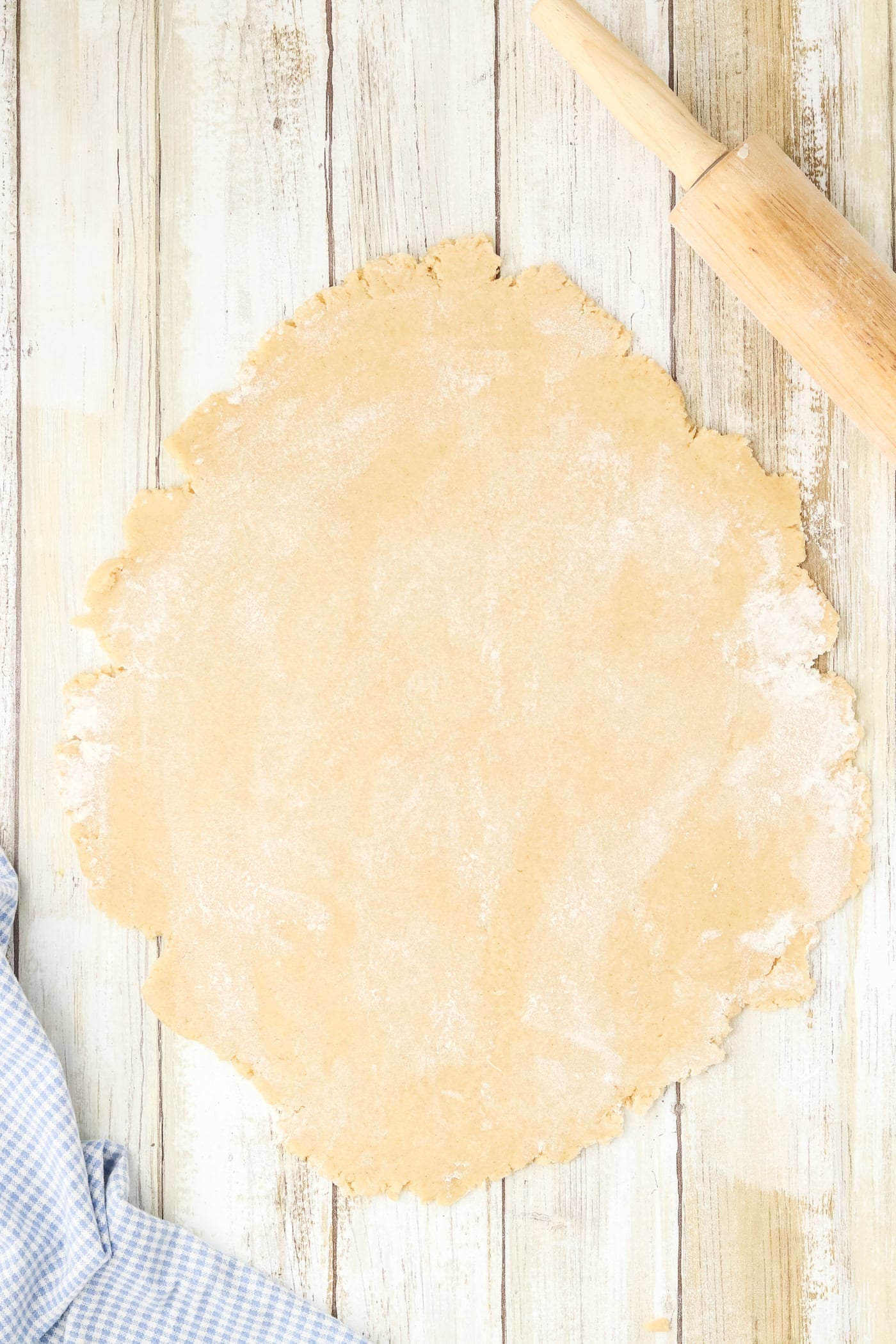rolling out dough for chalkboard sugar cookies