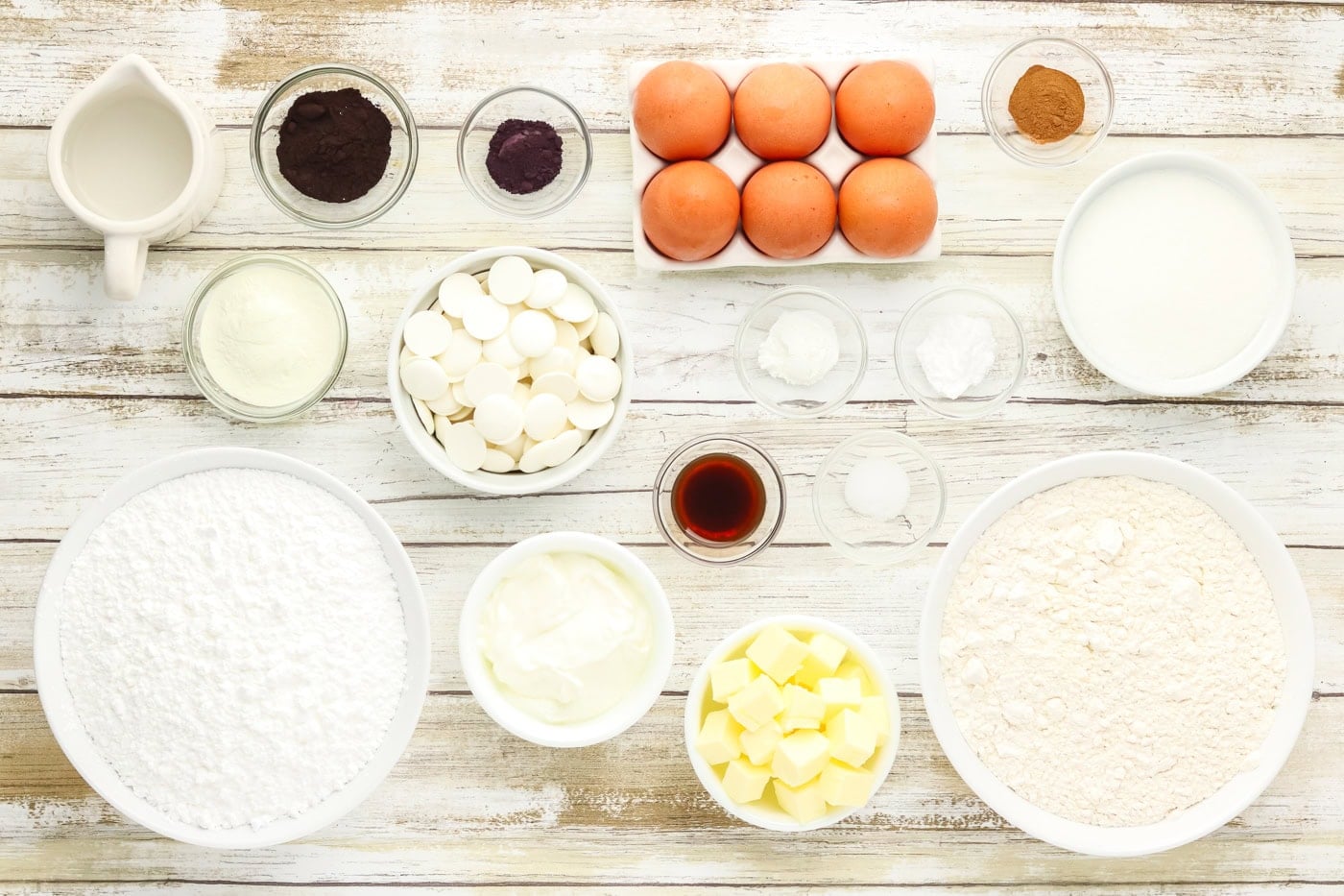 a top down photo of ingredients for baking sugar cookies and making royal icing
