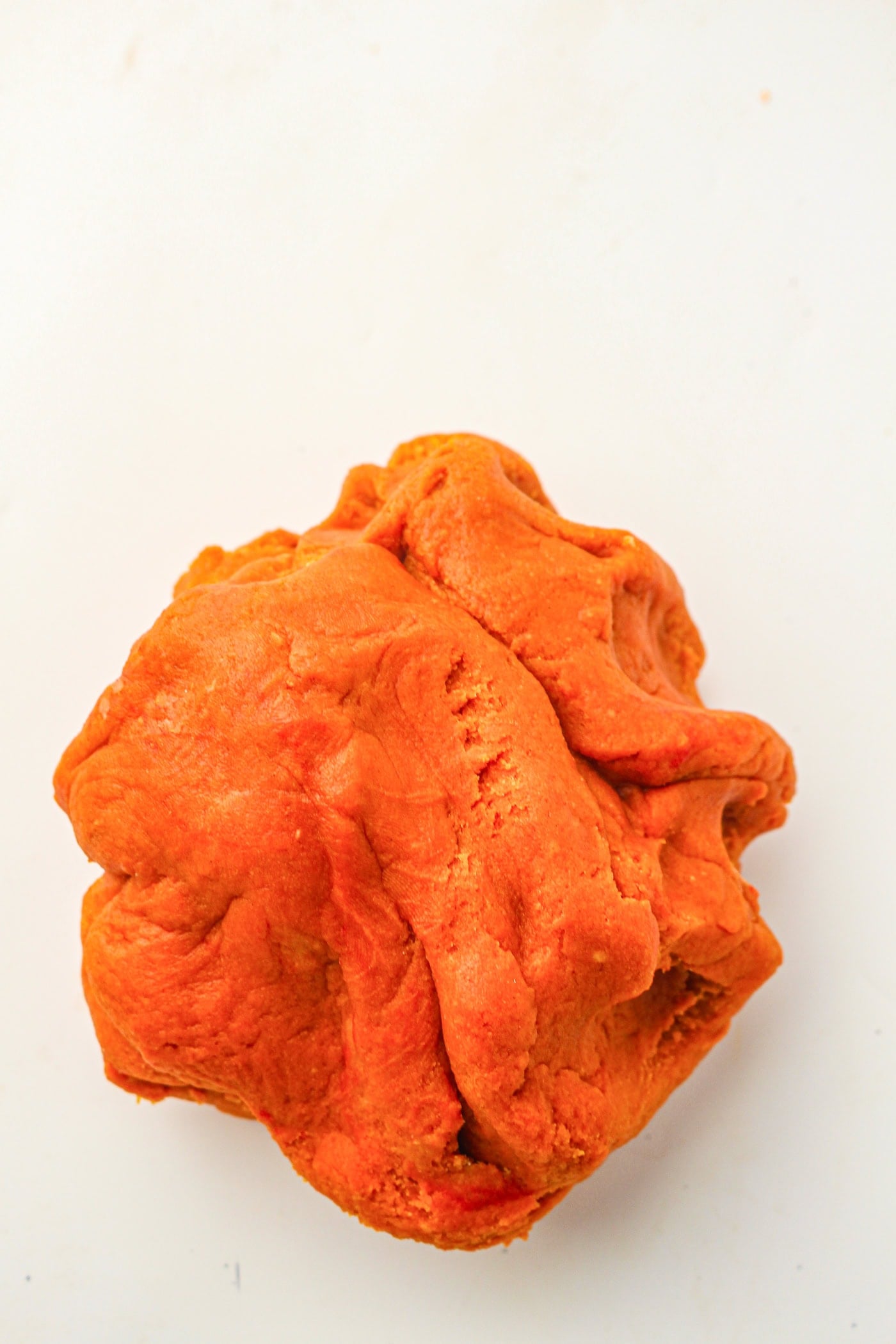 a rough ball of homemade fall play dough