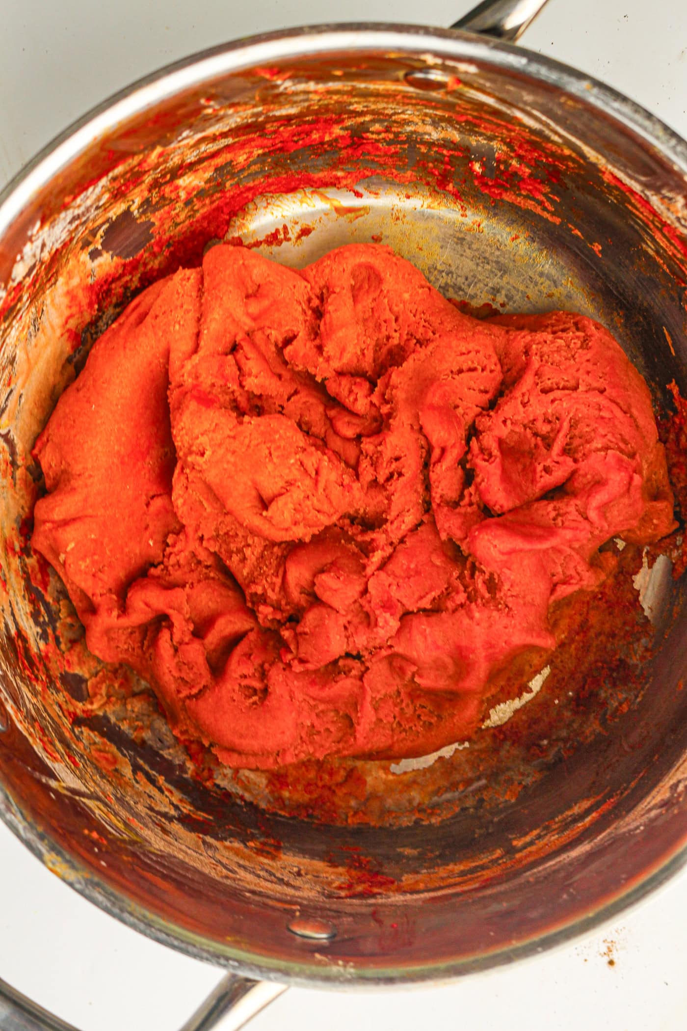 cooked fall play dough in a saucepan