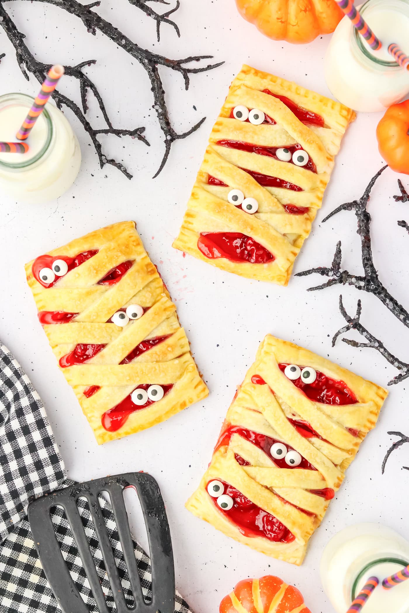 a stop down photo of baked mummy themed puff pastries