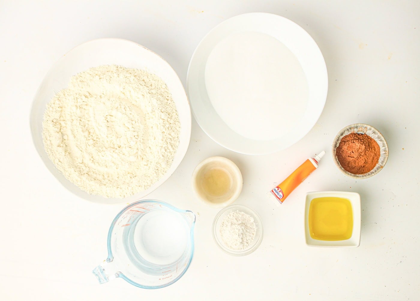 a top down photo of ingredients for making homemade fall play dough